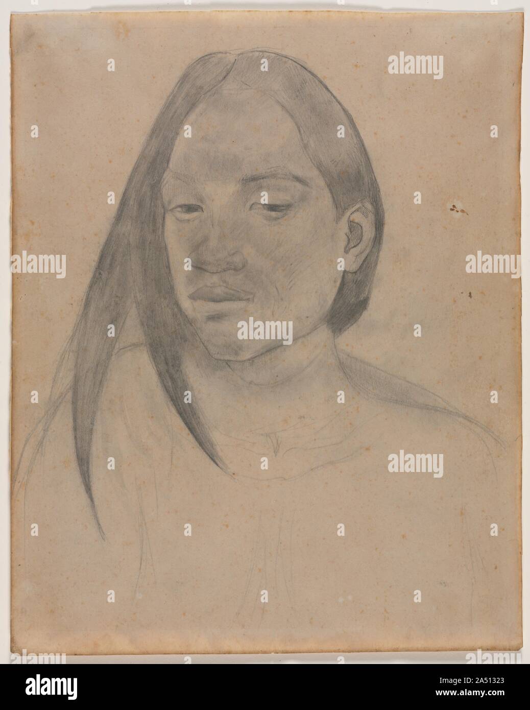 Head of a Tahitian Woman, 1891. This drawing belongs to a group of highly finished portrait drawings of Tahitians made by Gauguin shortly after his arrival in the South Seas. When acclimating to a new place, Gauguin initially delayed painting, preferring first to familiarize himself with the landscape and people through observation and drawing. The meticulous quality of this graphite study suggests that it was made from life. The woman&#x2019;s noble face and enigmatic expression allude to the spirituality and melancholy that Gauguin sought to conjure in his Polynesian work. Stock Photo