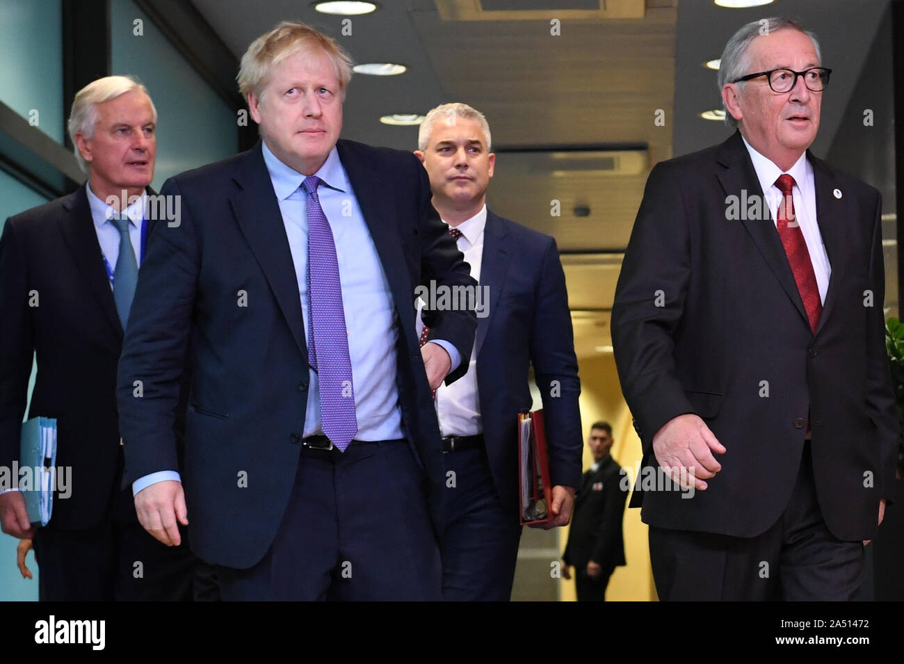 Michel Barnier, the EU's Chief Brexit Negotiator, Prime Minister Boris Johnson, Brexit Secretary Stephen Barclay and Jean-Claude Juncker, President of the European Commission, ahead of the opening sessions of the European Council summit at EU headquarters in Brussels. Stock Photo
