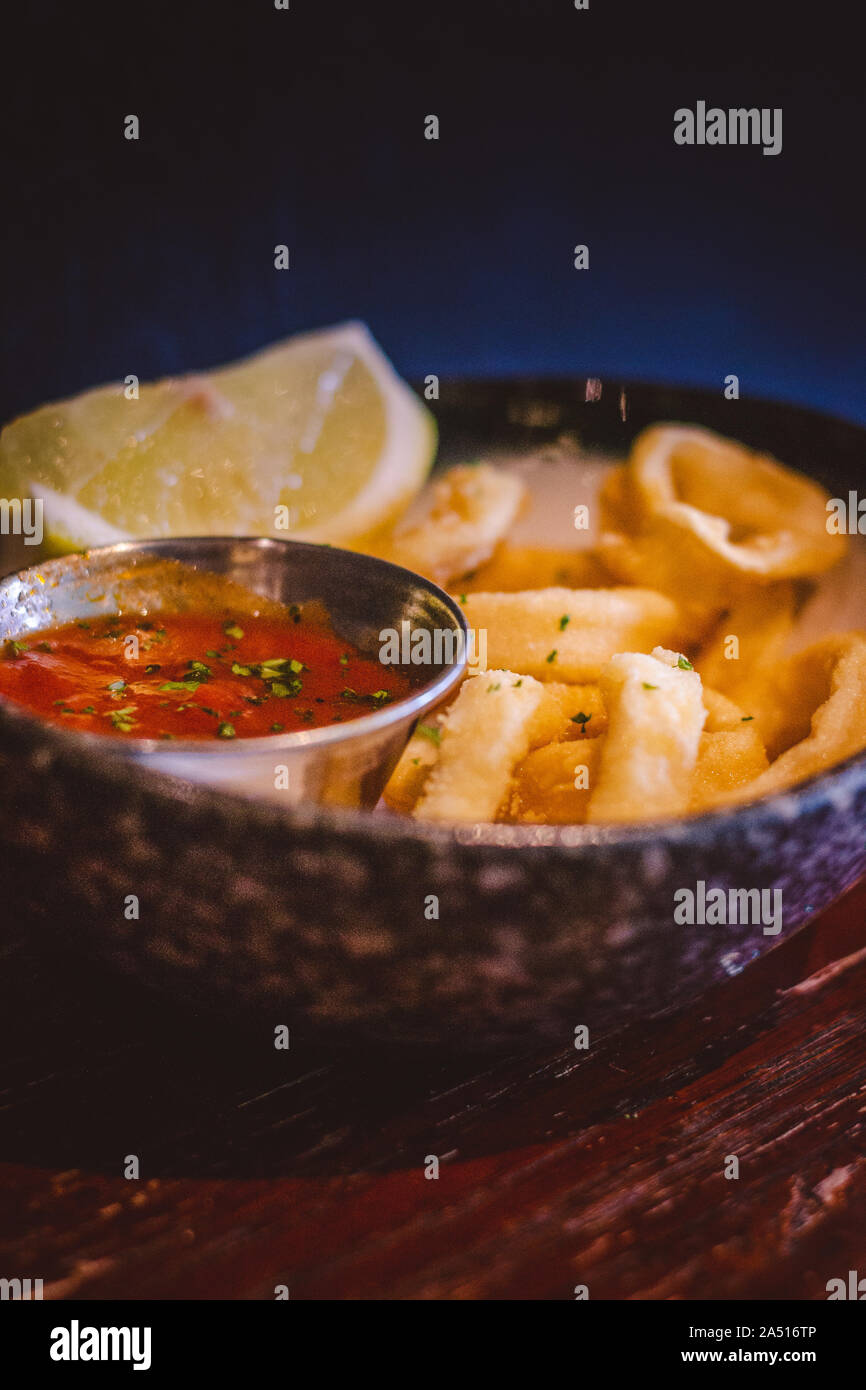 Fried Calamari Crispy Calamari served with tomato sauce pomodoro dip