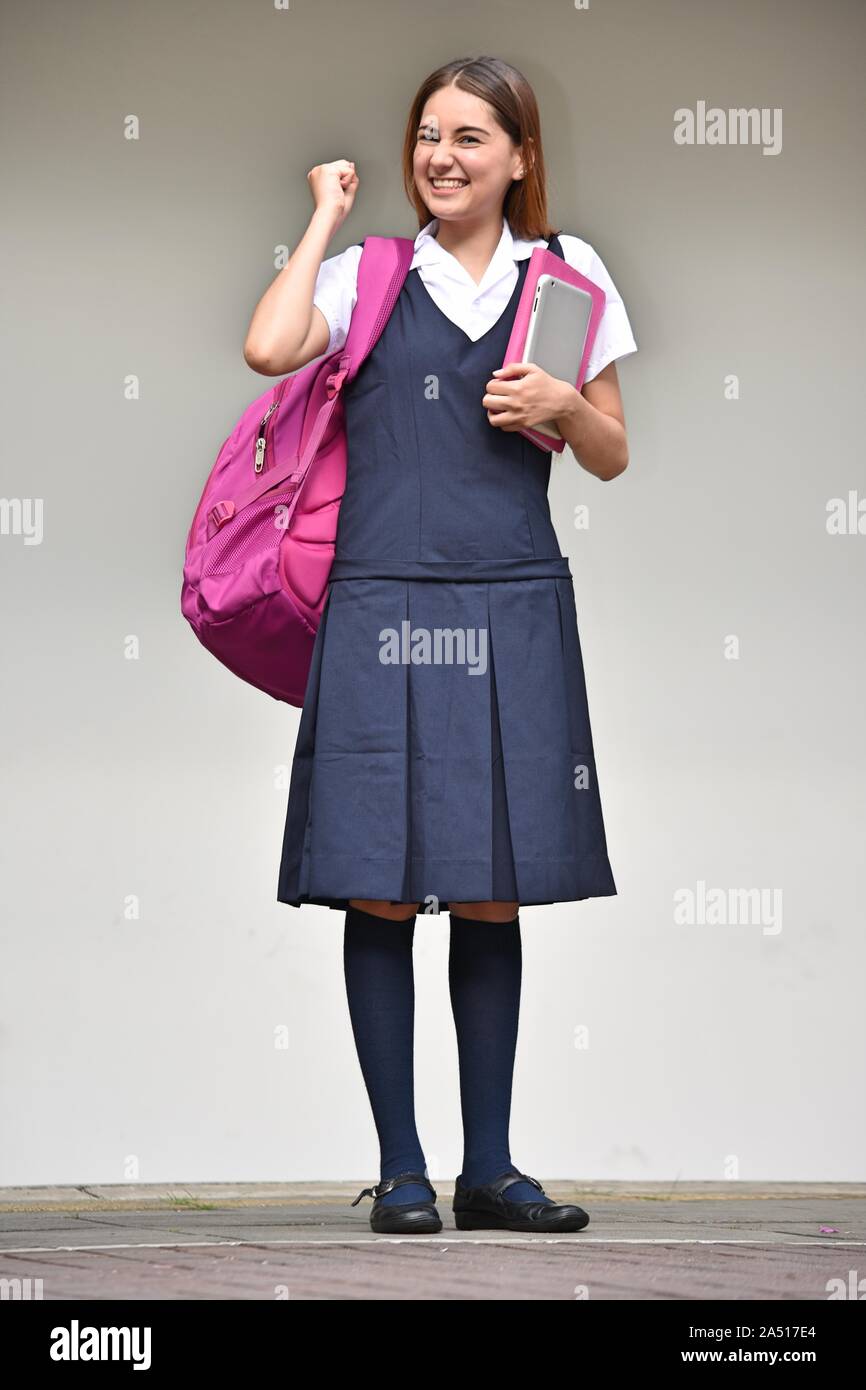 Excited Student Teenager School Girl Wearing Skirt While Standing Stock Photo