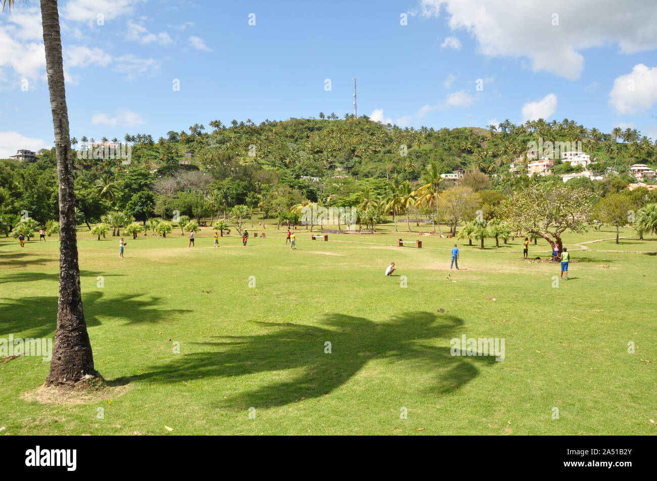 Children playing baseball, Samana city, Dominican Republic Stock Photo