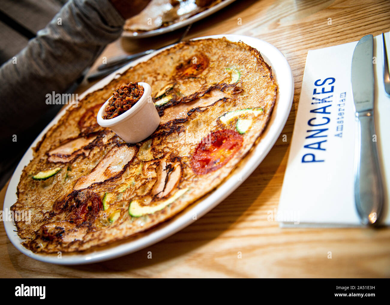 traditional savory style pancake,Amsterdam. Stock Photo