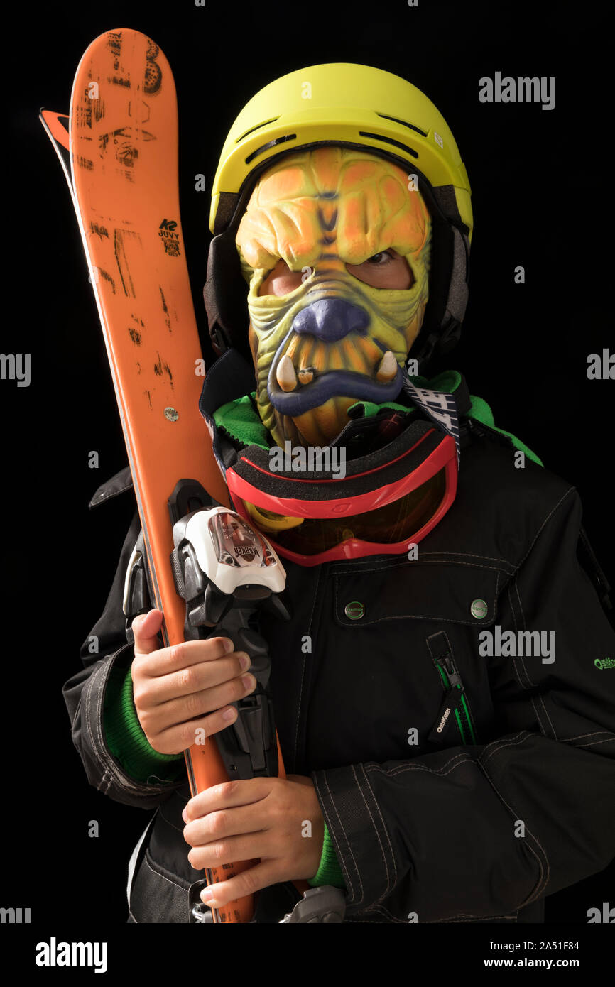 halloween costume, monster face in ski outfit Stock Photo
