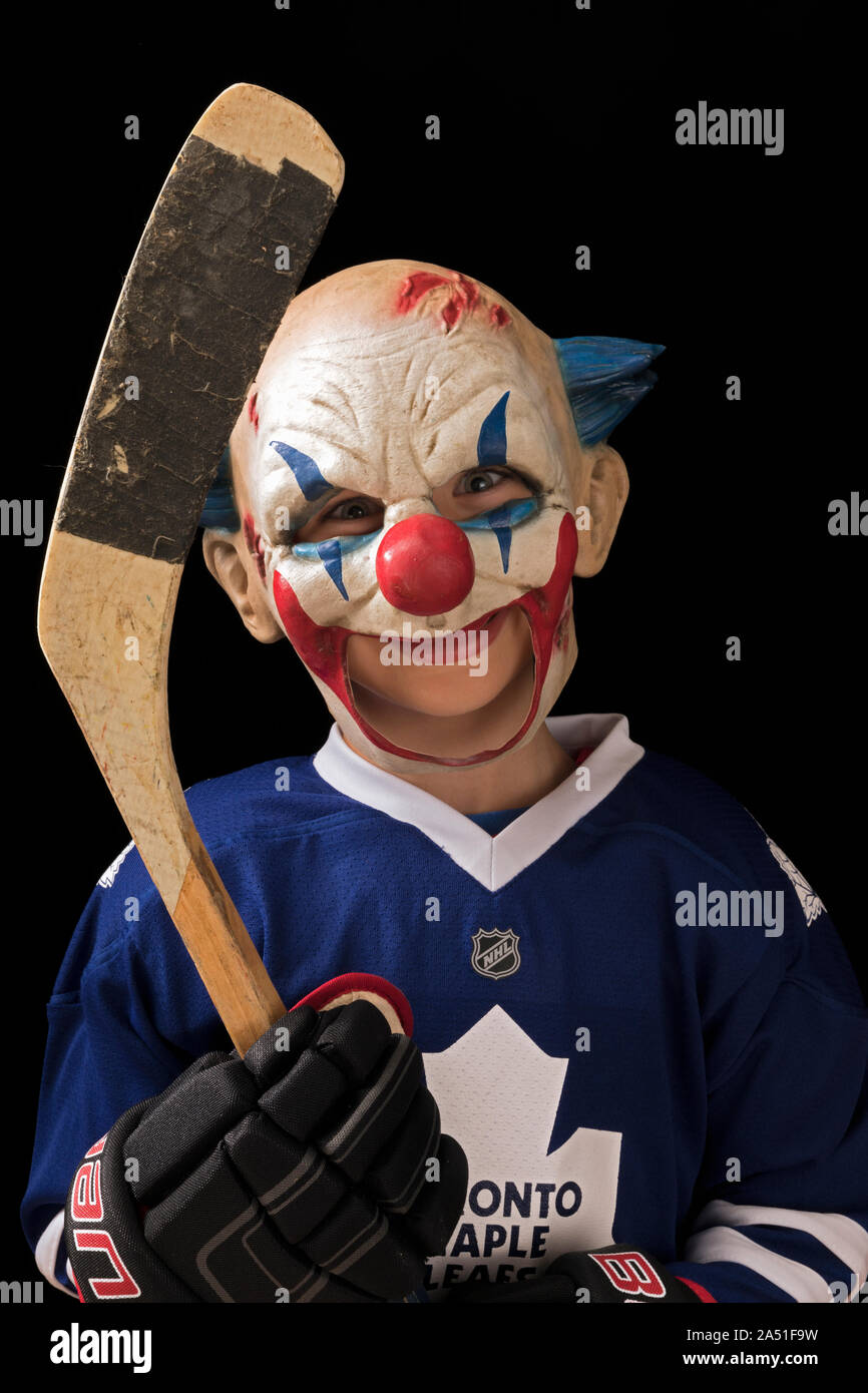 child in halloween costume as a hockey player Stock Photo