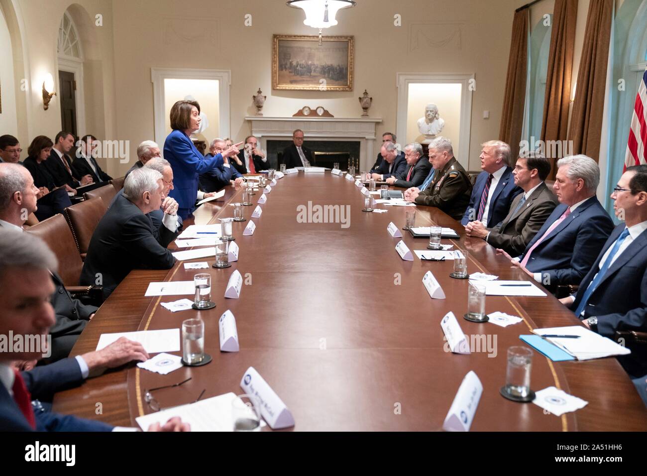Washington, United States of America. 16 October, 2019. U.S Speaker of the House Nancy Pelosi, left, confronts President Donald Trump, right, after he insulted her during a meeting on Syria in the Cabinet Room of the White House October 16, 2019 in Washington, DC. The meeting called by the president to discuss the crisis along the Syrian - Turkey border devolved into a confrontation before the Speaker walked out.   Credit: Shealah Craighead/White House Photo/Alamy Live News Stock Photo