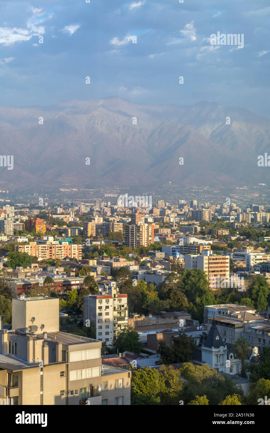 Cityscape viewed from the Crowne Plaza Hotel in the late afternoon with the Andes mountain range behind, Santiago, Chile, South America Stock Photo