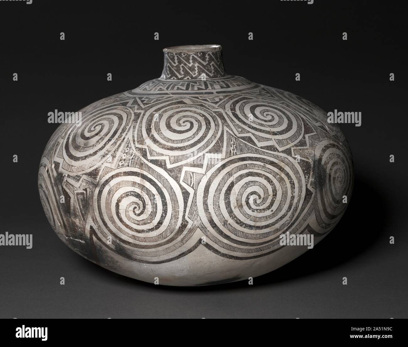 Olla (Jar), c. 1100-1250. The Anasazi lived for centuries in small agricultural settlements scattered across Four Corners region of the southwest. After AD 850, however, favorable factors converged and they built the most ambitious architectural projects ever constructed in native North America: Chaco Canyon's great houses and cliff dwellings at such sites as Mesa Verde. Pottery-making also reached a high point during this period, as this vessel testifies. By 1300 the Anasazi had dispersed, forming groups ancestral to many modern Pueblo peoples, including the Hopi and the Zuni. Stock Photo