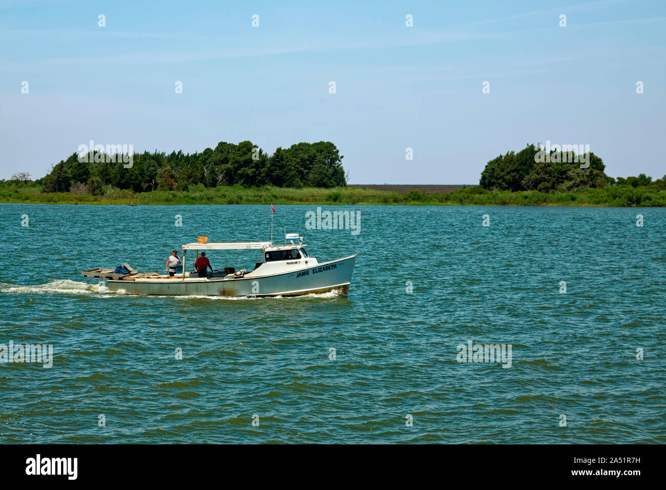 fishing boat motoring; watermen; occupation, working boat, motion