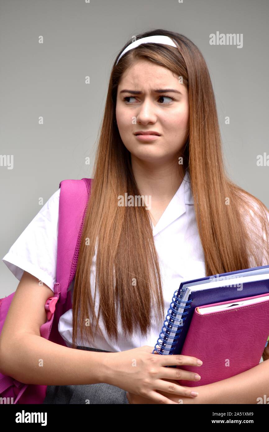 Female Student And Confusion Wearing School Uniform Stock Photo Alamy