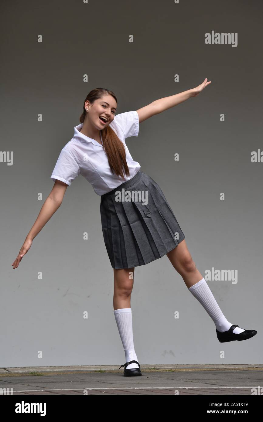 Cute Colombian Female Posing Wearing Skirt Standing Stock Photo - Alamy