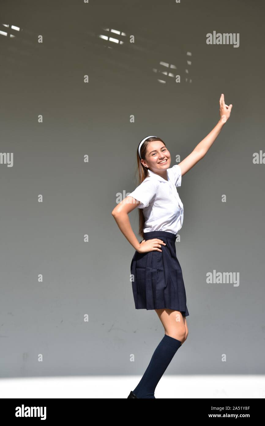 Excited Cute Colombian Teenage Female Wearing Skirt Stock Photo