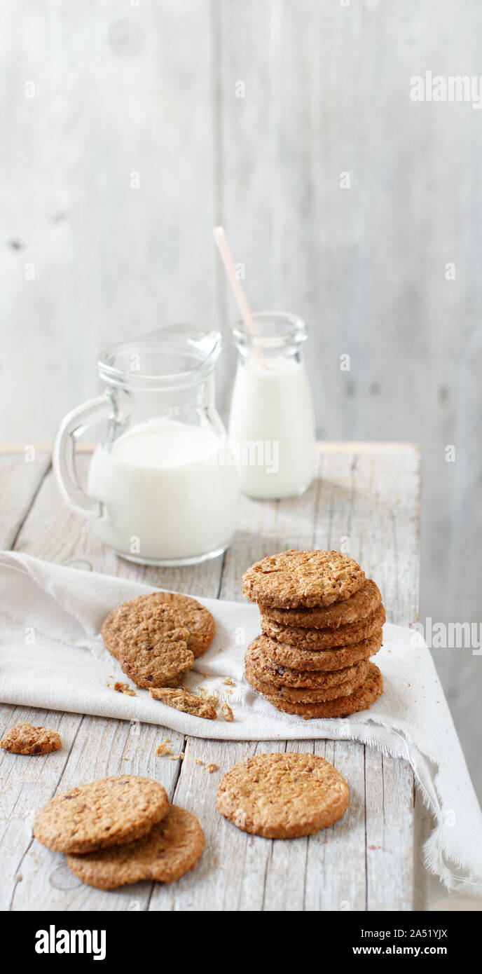 Homemade oatmeal cookies with milk close up Stock Photo Alamy