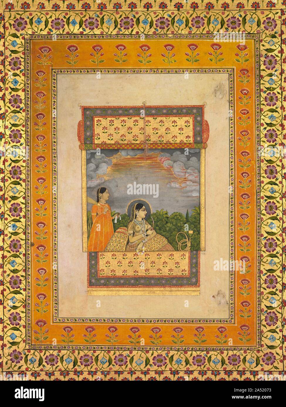 Princess and attendant in trompe l&#x2019;oeil window, c. 1765. Although unidentifiable by inscription or individualized portrait features, the seated figure can be recognized as a powerful royal woman, the model for whom might be the mother or wife of Muhammad Shah, the last Mughal emperor able to fully support the arts at the imperial court. The halo of light comes from the sky, indicating divine light behind her, rather than being generated from her. A golden window shade has been rolled up to reveal the princess, with her attendant holding royal emblems of honor: the white cloth and the pe Stock Photo