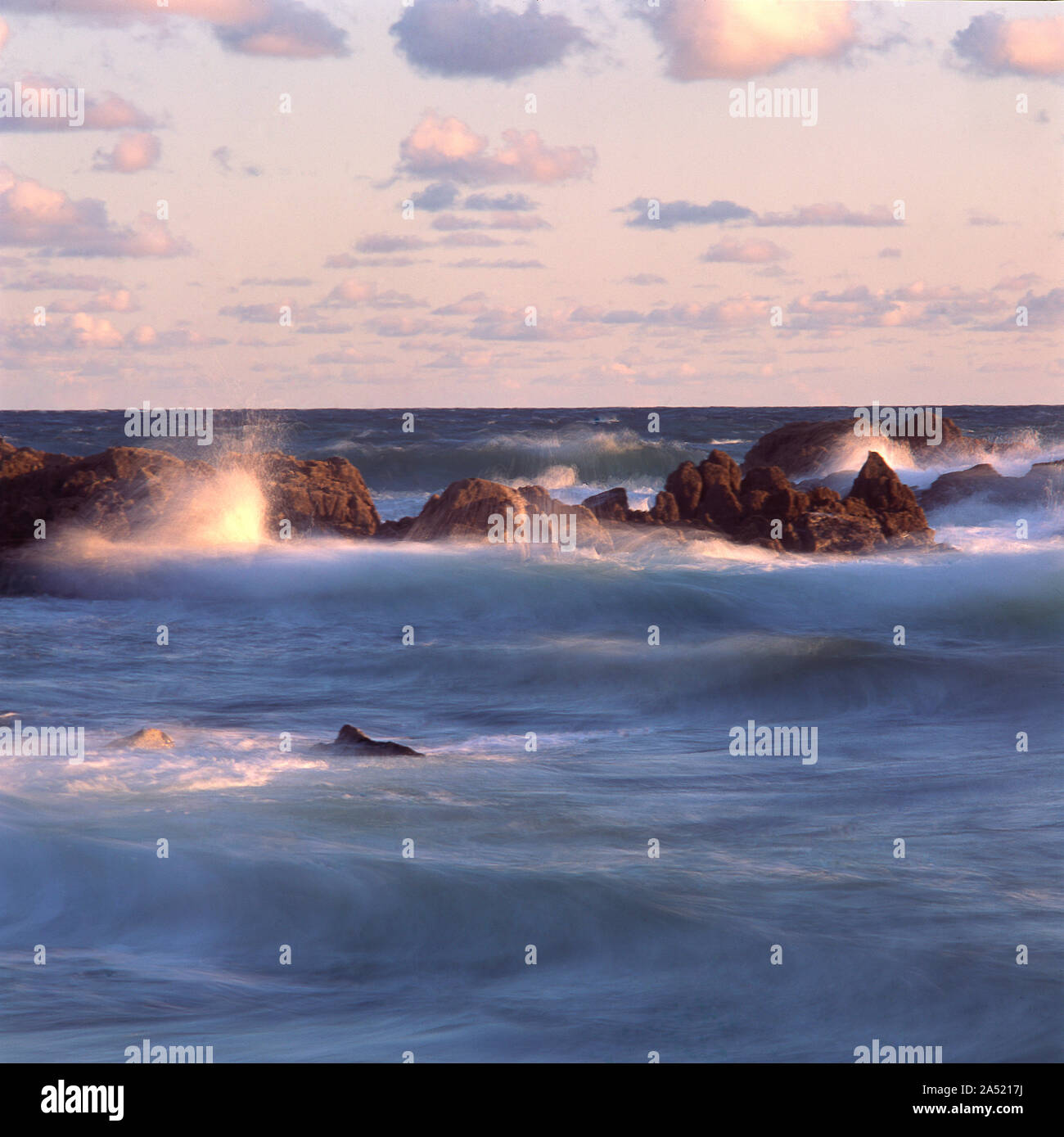 Waves on rocky seashore, Brittany, France Stock Photo - Alamy