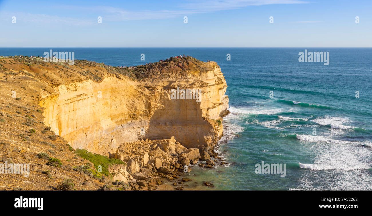 Visitors on lookout point in the Port Campbell National Park, near Port Campbell, Great Ocean Road, Victoria, Australia. Stock Photo