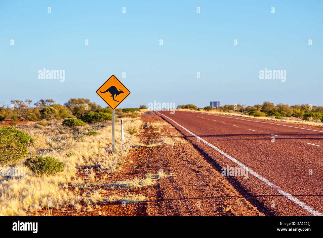 Kangaroo road sign on remote outback road Stuart Highway connecting Port Augusta, South Australia with Alice Springs, Northern Territory, Australia Stock Photo
