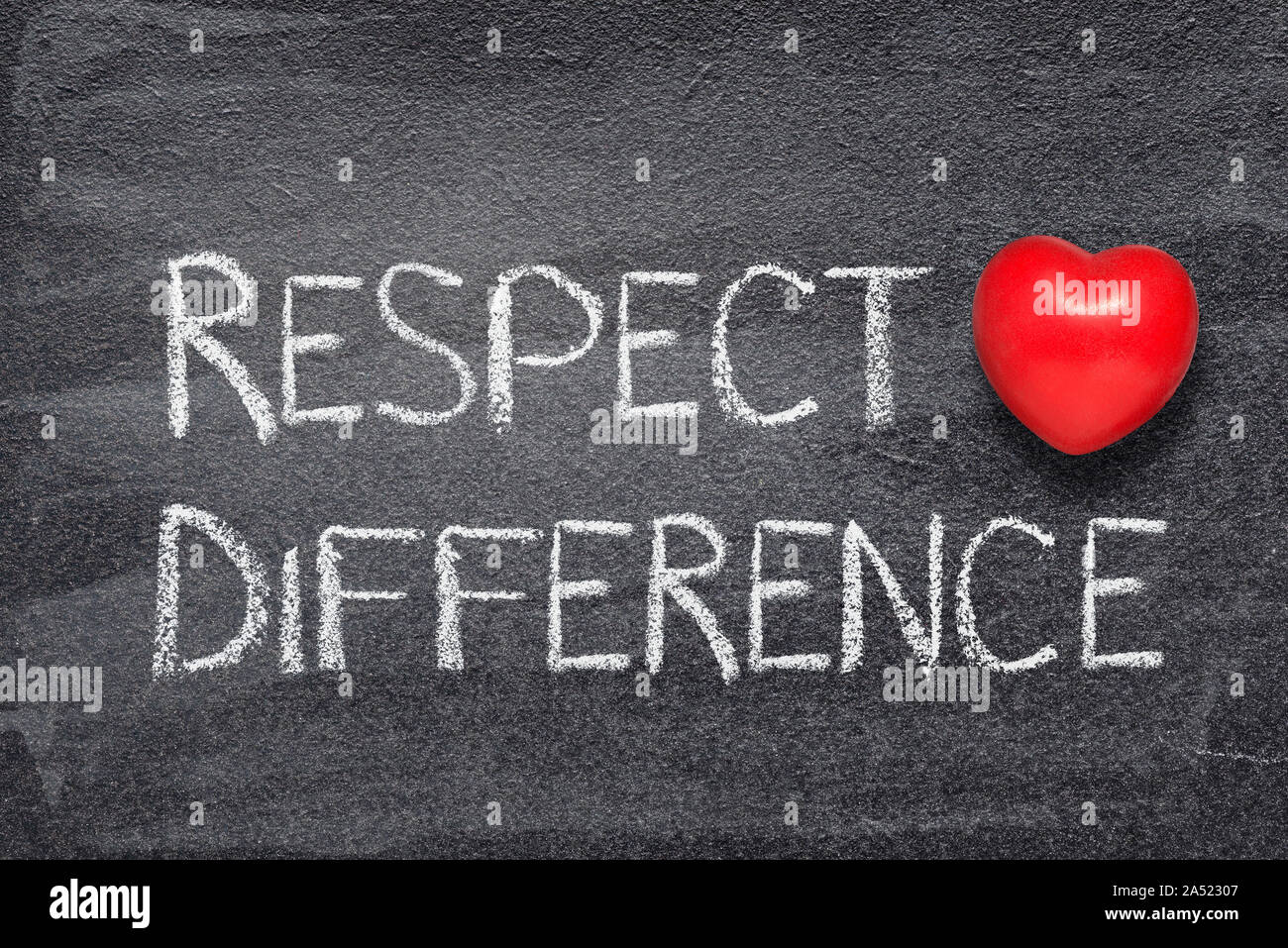 respect difference phrase written on chalkboard with red heart symbol Stock Photo