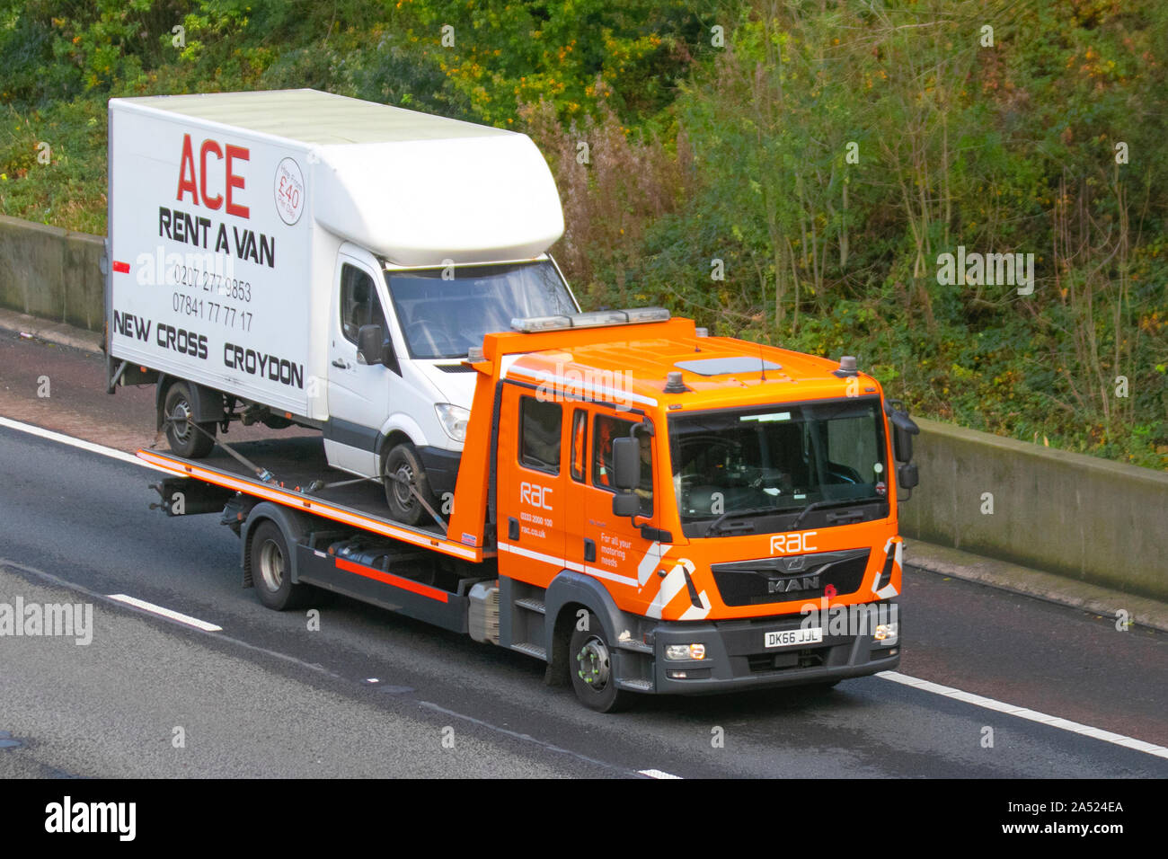 Motorway RAC Vehicle 24hr Recovery; roadside assistance, heavy bulk Haulage delivery trucks, haulage, broken down lorry, transportation, truck, special cargo, 2016 Man TGL vehicle, delivery, transport industry freight on the M6 at Lancaster, Stock Photo