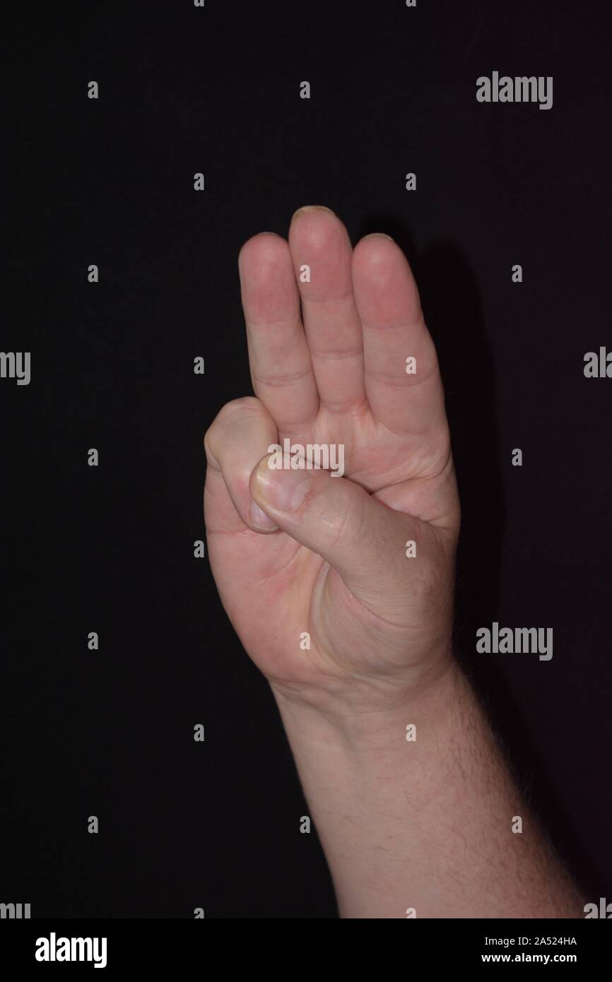 Hand Gesture Holding Up Three Fingers Stock Photo Alamy hand-gesture-holding-up-three-fingers-stock-photo-alamy