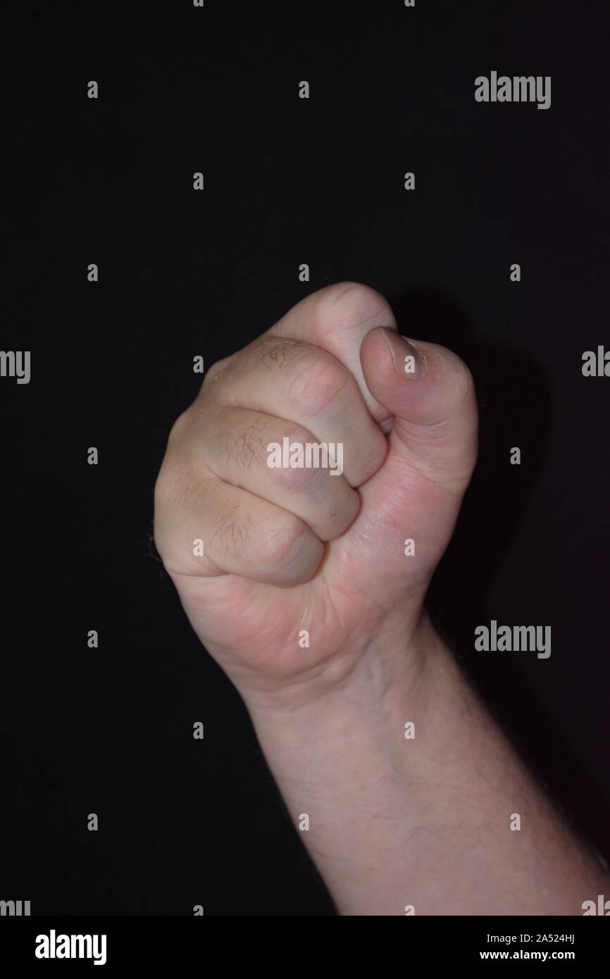 Hand Gesture Showing Victory punch in the air Stock Photo Alamy