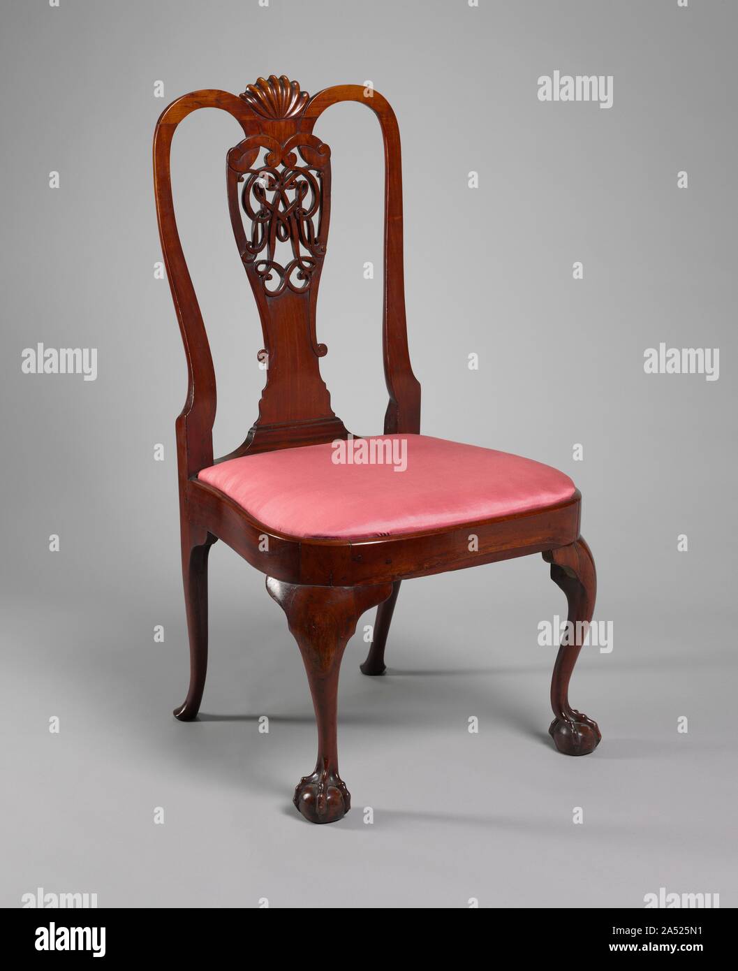Side Chair, c. 1760. Chairs with their splats pierced with a decorative monogram are rare in eighteenth-century English furniture, and this chair is part of a unique American set. The initials &quot;R.M.L.&quot; are those of Robert (1718-1775) and Margaret Beekman (1724-1800) Livingston of Clemont, a house on the Hudson River north of New York City. Stock Photo