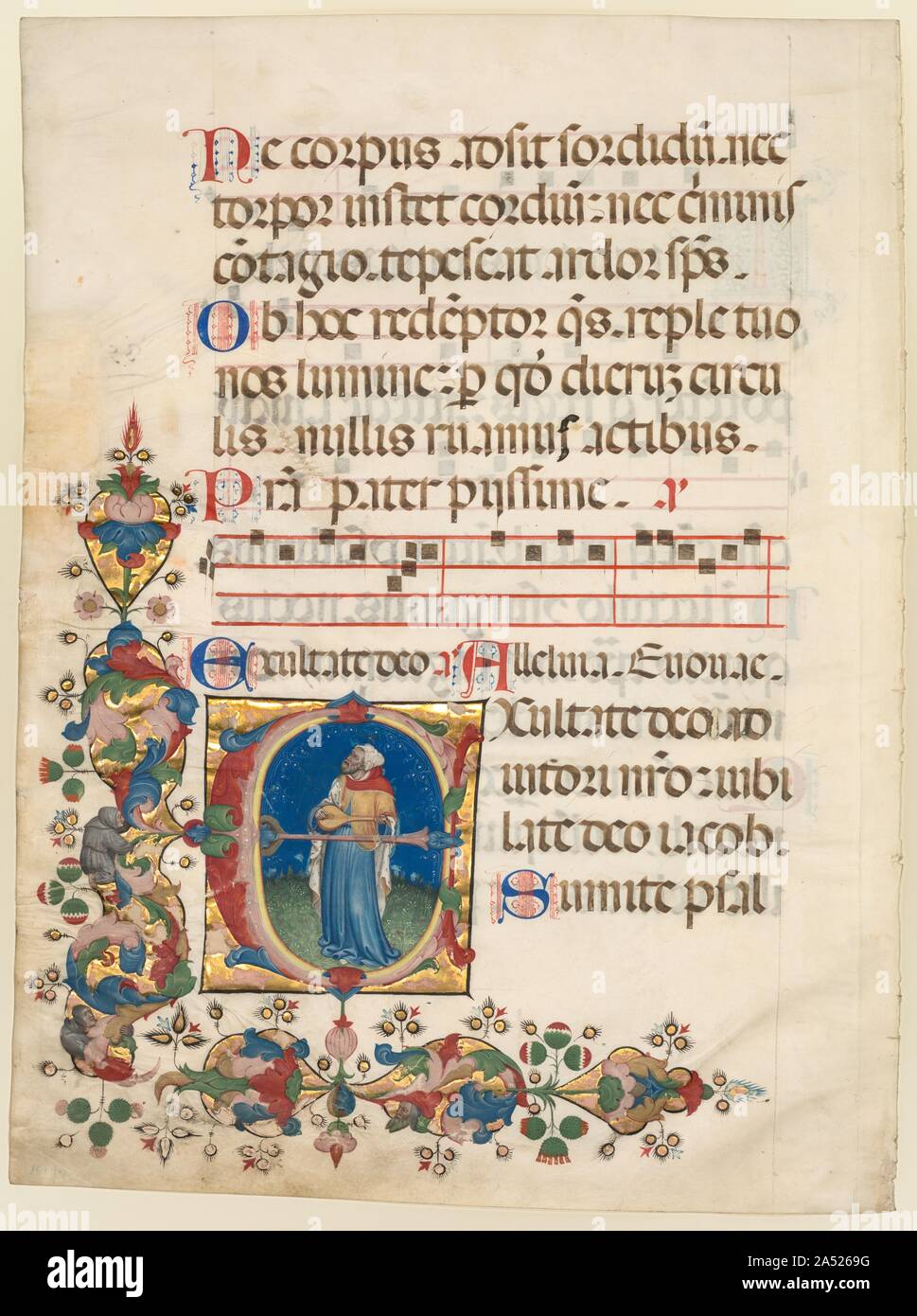 Single Leaf Excised from a Choir Psalter: Initial E[xultate Deo] with King David Playing the Lute (Psalm 80), c. 1408. This leaf once formed part of a deluxe choir psalter produced for the Franciscan convent of Bologna (founded 1229). The initial  E  with a portrait of King David illustrates the introduction to Psalm 80:  Exultate Deo  (Rejoice to God). King David, as the author of the Psalms, is prominently illustrated in psalter initials. An abundant spray of colourful acanthus leaves with clambering Franciscan friars provides decoration for the lower left margins and confirmation that it wa Stock Photo