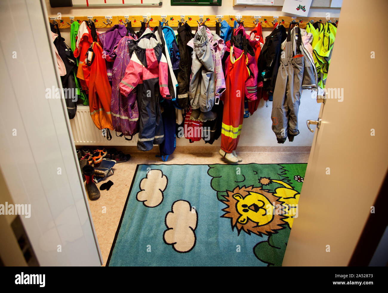 Clothes in the hall at a preschool.Photo Jeppe Gustafsson Stock Photo