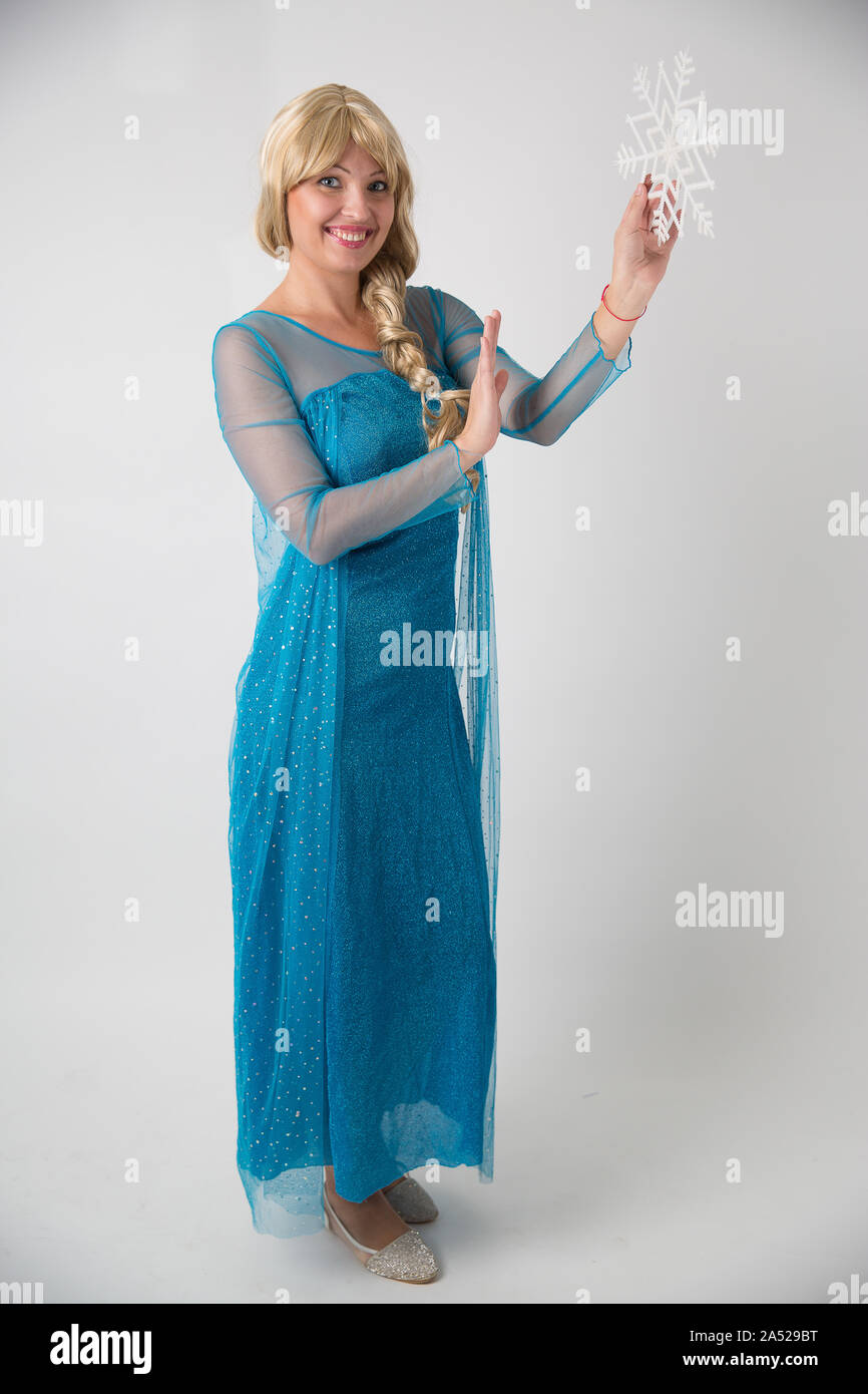 Israel, Tel Aviv October 14, 2019: Elsa from Frozen, Beautiful and Nice Lady Blonde Hair in Snow Blue Evening Gown Stock Photo