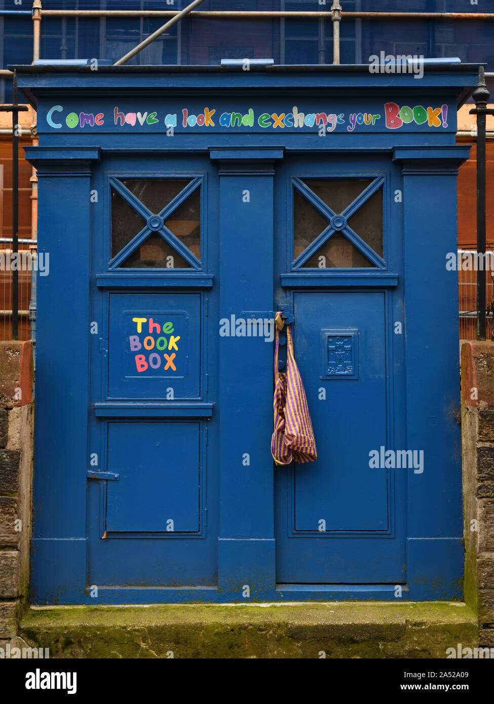 The Book Box book exchange at Edinburgh's Royal Mile Primary School which is a converted police box, in Scotland, UK Stock Photo