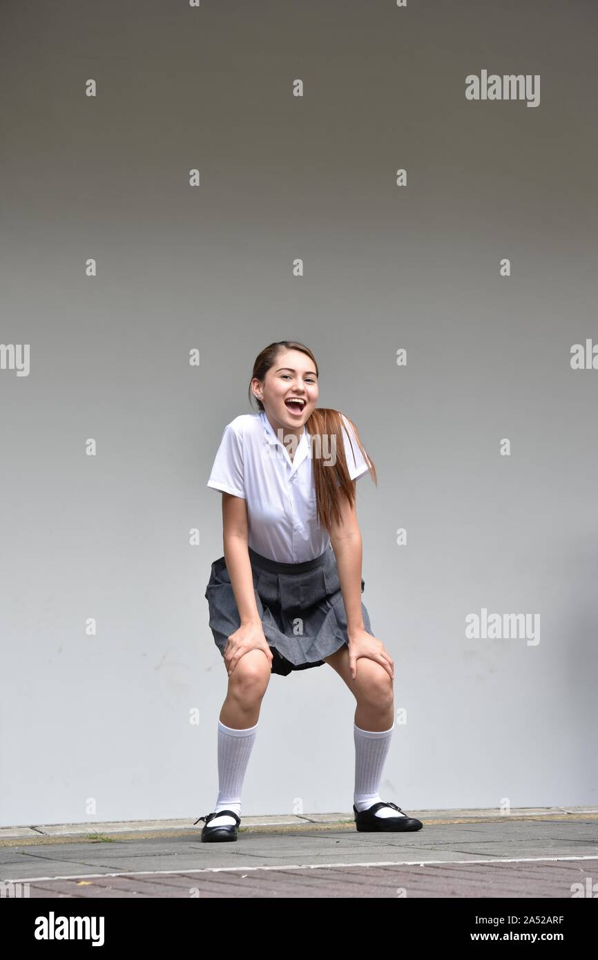 Cute Colombian Female Having Fun Wearing Skirt Standing Stock Photo - Alamy