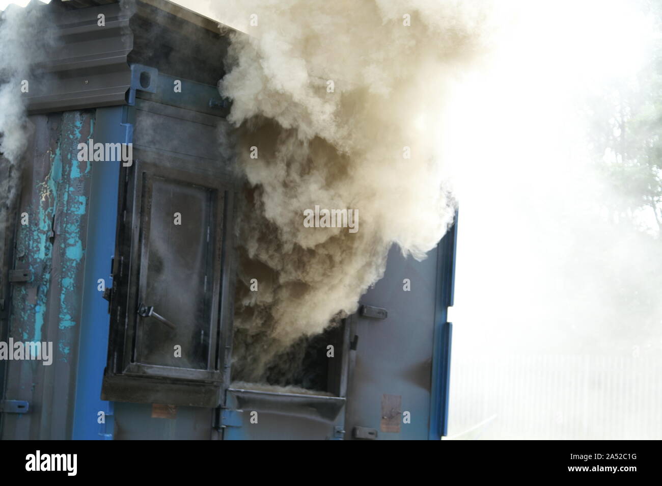 backdraft boiling smoke and hot gasses Stock Photo