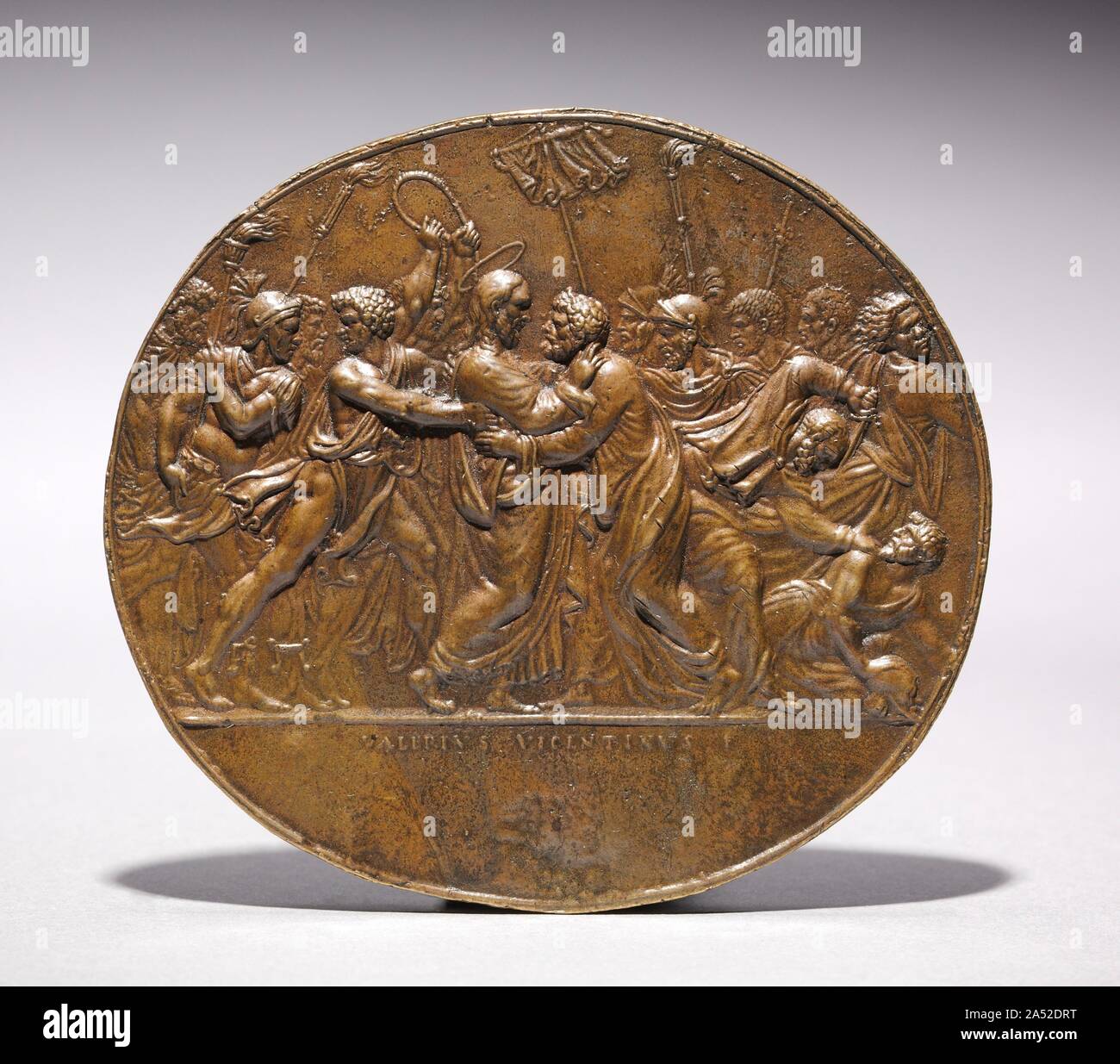 The Betrayal of Christ, c. 1525. Born in Vicenza, Belli worked in Rome as a successful crystal and gem engraver, goldsmith, and medalist. His bronze plaquettes come almost without exception from crystal or hardstone carvings. This particular plaquette directly derives from a rock crystal intaglio by Belli bearing the same inscription in the Biblioteca Apostolica Vaticana, which originally was mounted with two other oval medallions of Christ Carrying the Cross and the Entombment in the silver-gilt base of a rock crystal crucifix, also in the collection of the Vatican Library. This crucifix is g Stock Photo