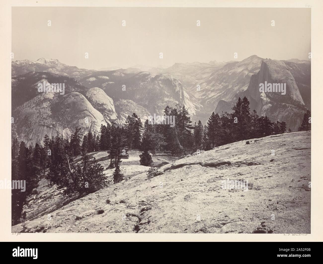 The Domes, from the Sentinel Domes, Yosemite, c. 1865-1866. Although prolific in all types of commercial photography, Carleton Watkins was best known for his majestic images of Yosemite Valley. He first transported his mammoth-plate camera there in 1861 and returned many times to record America's natural treasure. Besides establishing aesthetic and technical standards of excellence for landscape photography, Watkins's work was instrumental in passing the 1864 Congressional bill enacted to protect Yosemite from development. In this panoramic view, he displayed elegantly curved rock formations i Stock Photo