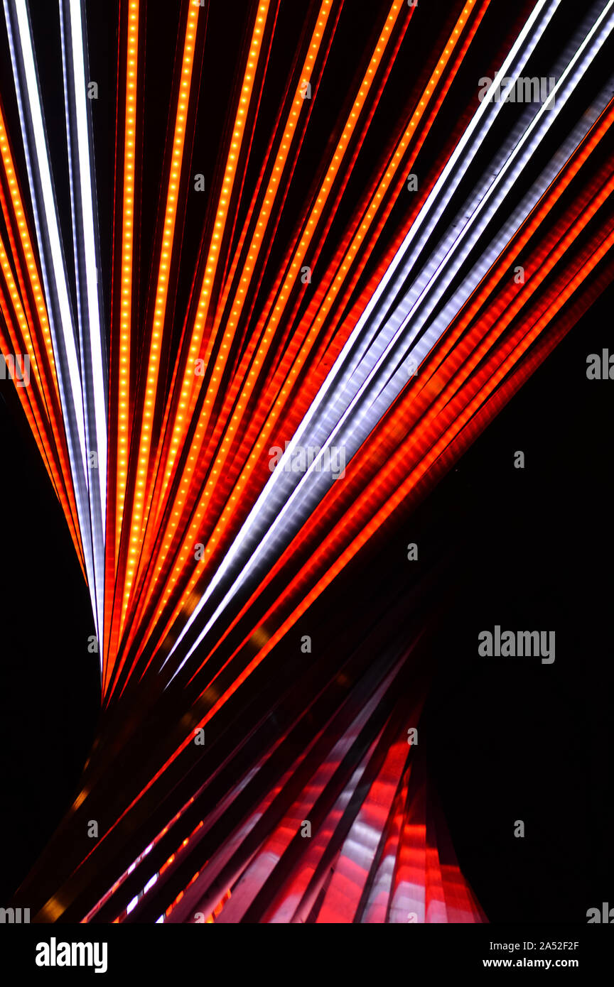 Abstract Festive Vertical Background With Red Orange And White Led Stripes On A Black Background For Design On The Theme Of Christmas New Year Disc Stock Photo Alamy