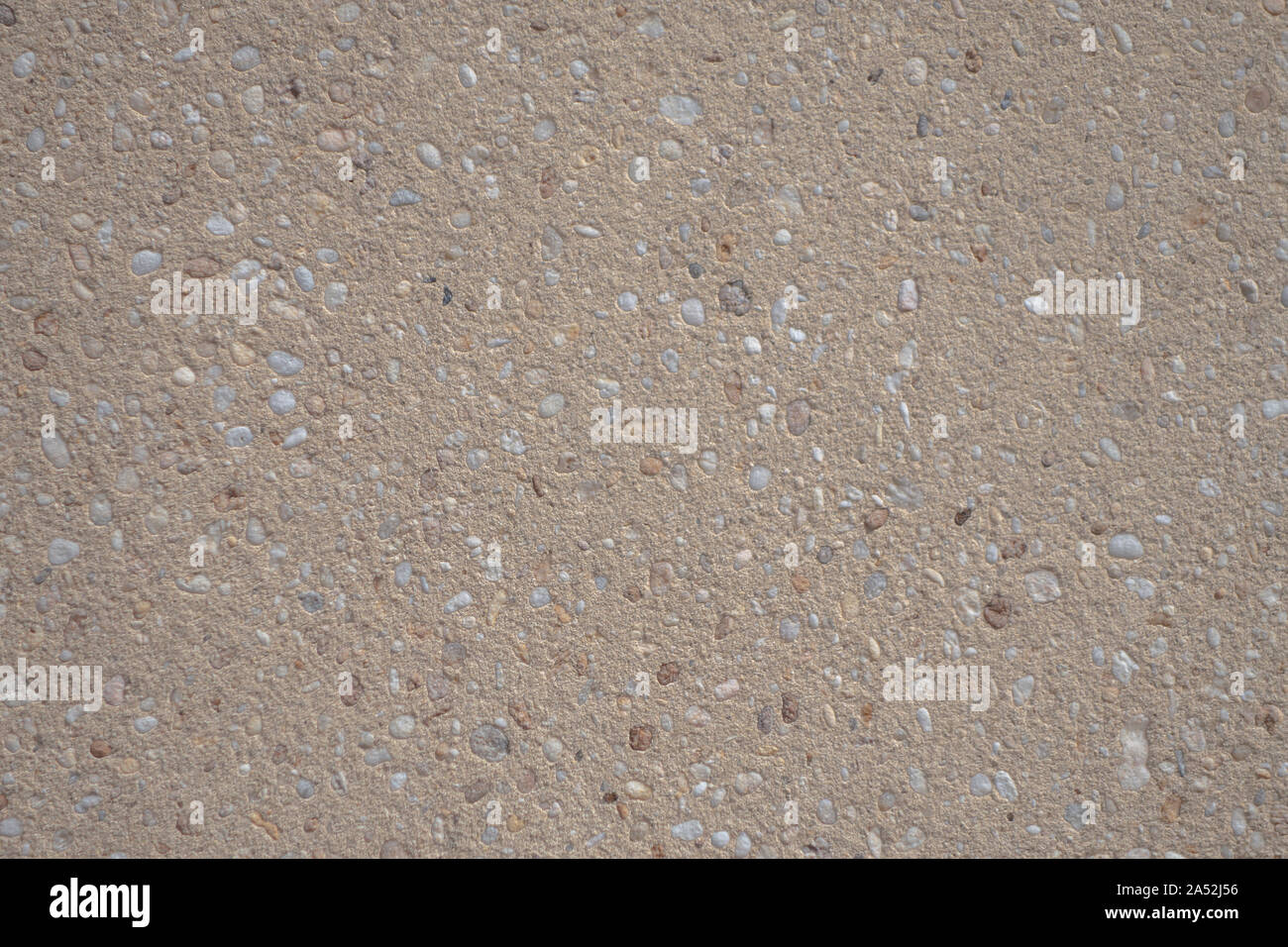 cemented small pebble round stone rock wall or floor Stock Photo