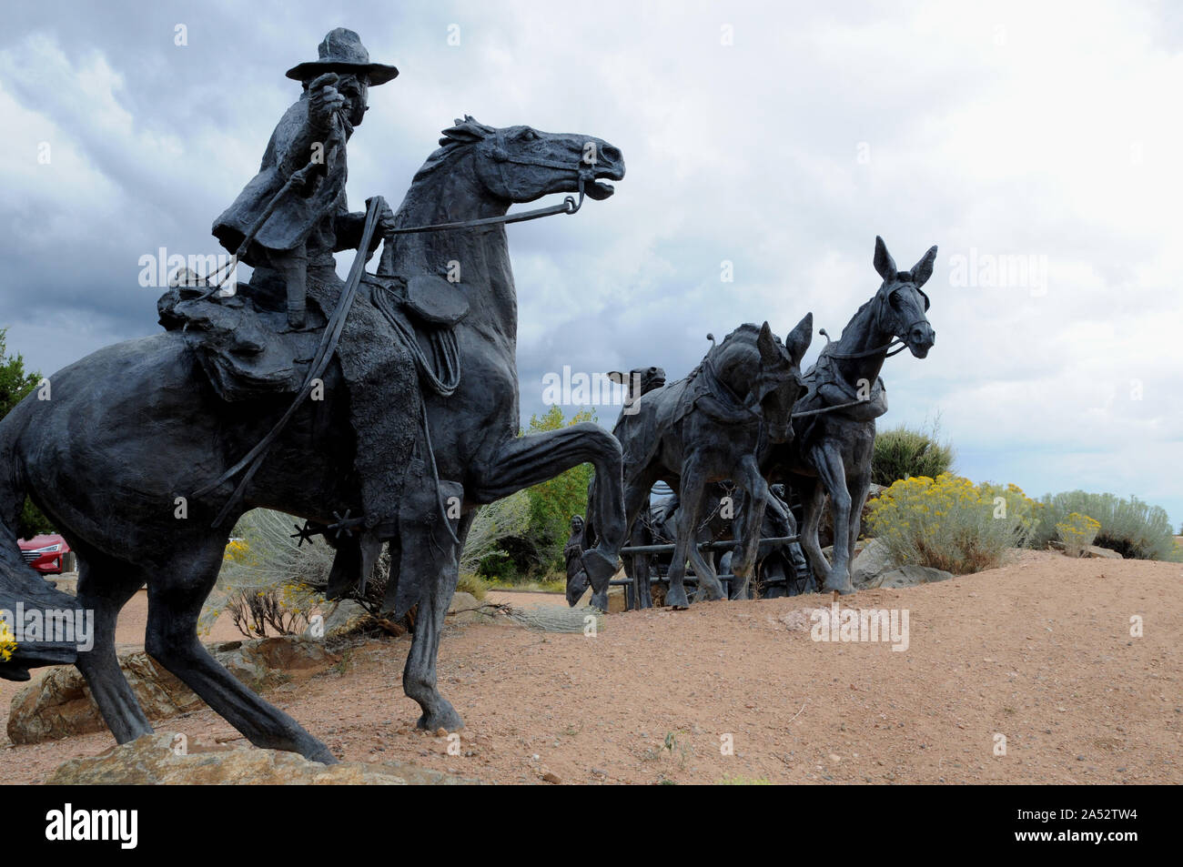 The sculpture entitled 'Journey's End' shows the arrival of a Santa Fe Caravan coming into Santa Fe. It was cast in bronze by Reynaldo 'Sonny'  Rivera. Stock Photo