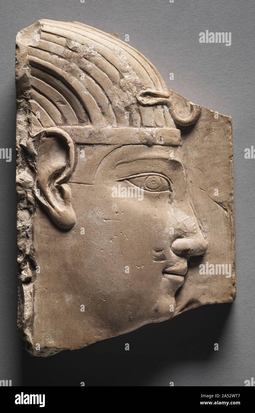 Votive Relief of a King, 305-246 BC. Trial pieces&#x2014;carved on limestone flakes, or  ostraca &#x2014;and sculptors models allow us to see how the ancient Egyptian artist approached his work. Showing the profile of a king in relief, this piece is a masterpiece in its own right, and was probably meant to be copied. Stock Photo