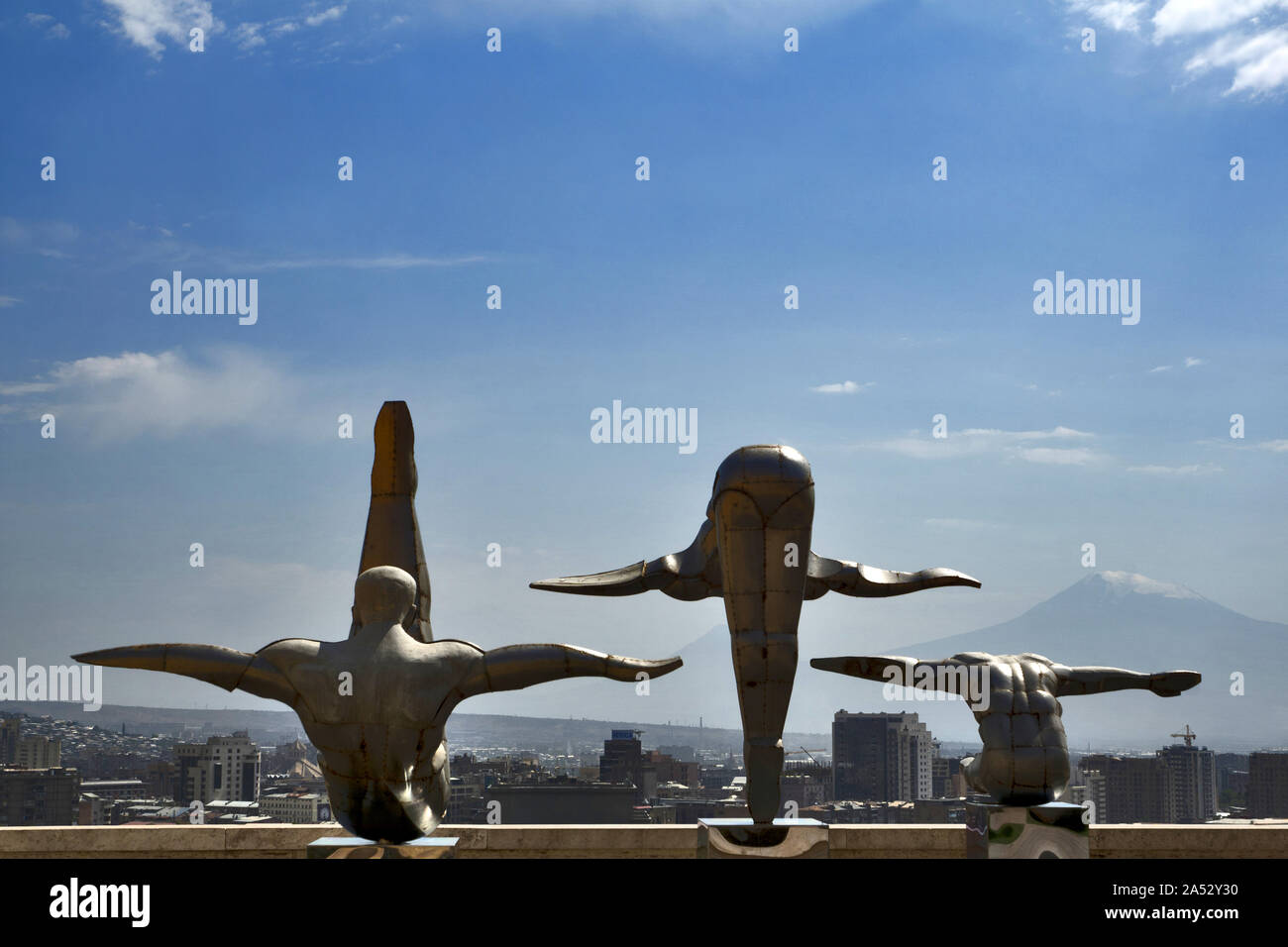 Erevan/Yerevan, Armenia: Cafesjian Center for the Arts II (Cascade Complex), Three gymnasts with Mount Ararat in the background Stock Photo