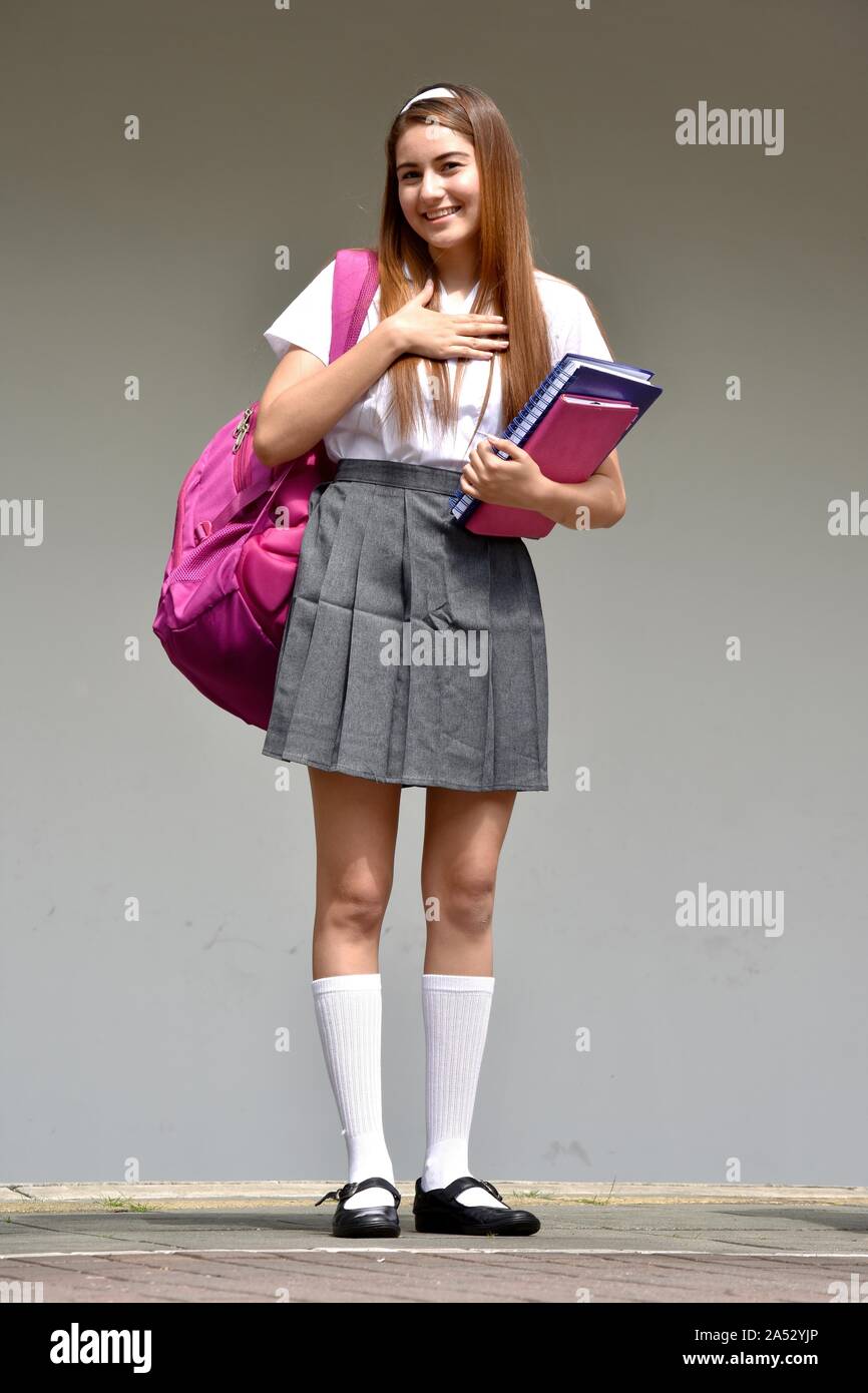 Female Student Holding Books Stock Photo - Alamy