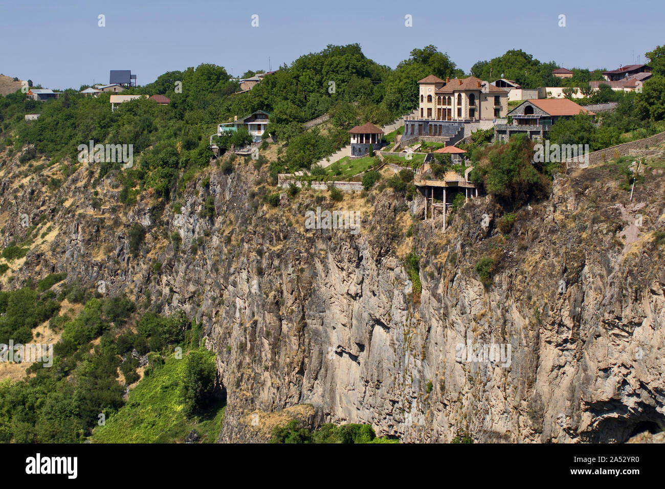 Armenia: Houses on a steep hillside near temple Garni Stock Photo