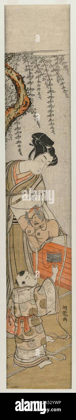 Young Man and Child with a Kite, early-mid 1770s. Kite-flying is a popular sport in Japan, especially during the New Year's festival. Fanciful kite forms include birds, butterflies, double fans, and portraits of heroes. Traditionally, only boys and men fly kites in Japan. Stock Photo