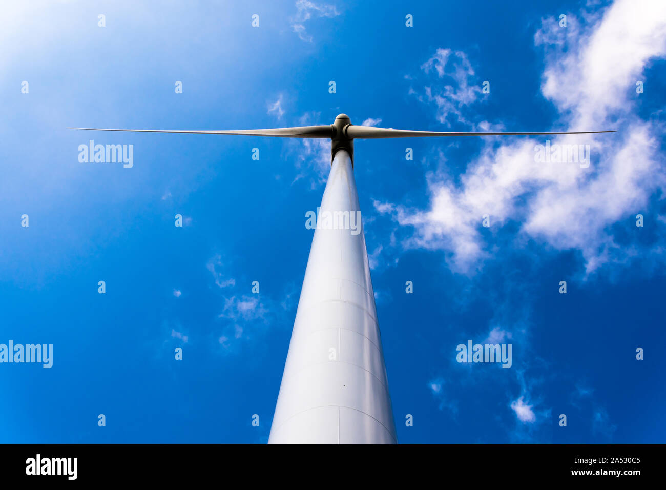 Windmills for the production of electrical energy. Wind farm of renewable, alternative and sustainable energy in Alta Anoia, Barcelona Stock Photo