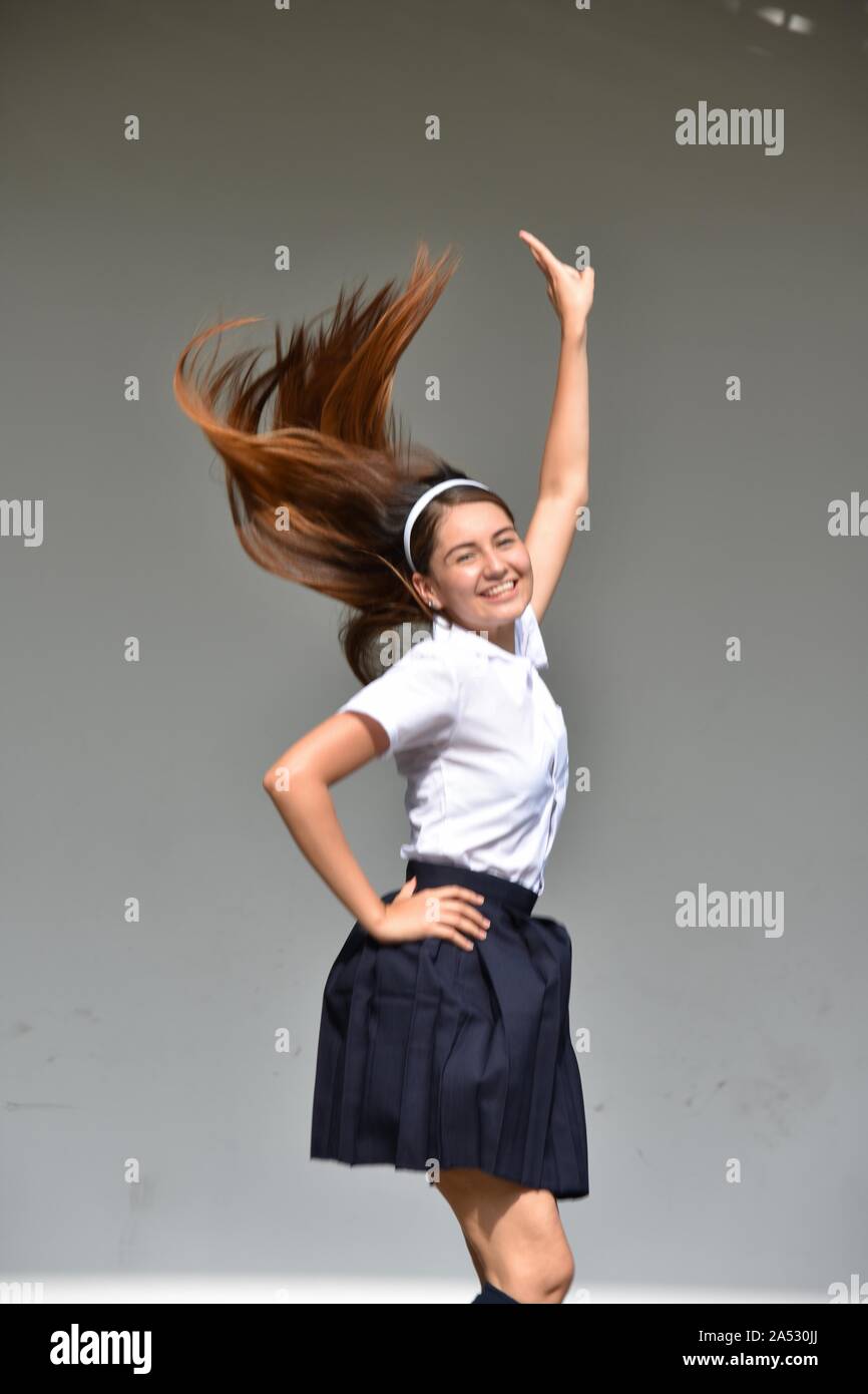 Excited Cute Colombian Female Wearing Skirt Stock Photo - Alamy