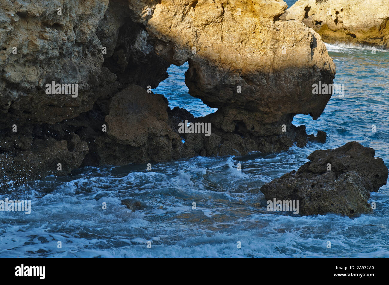 Aveiros beach scene during afternoon. Unique rocks and cliffs formations. Albufeira, Algarve, Portugal Stock Photo