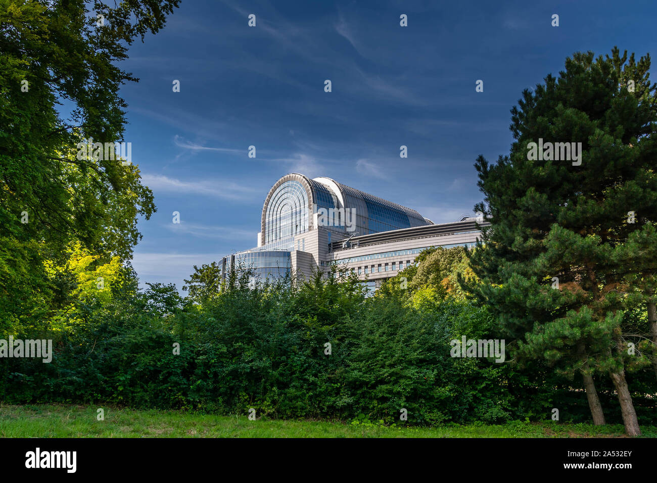 Far view of the European Parliament in Brussels from the park. Stock Photo