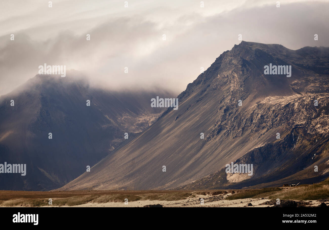 Dramatic Cloudy Mountain View in Iceland Stock Photo
