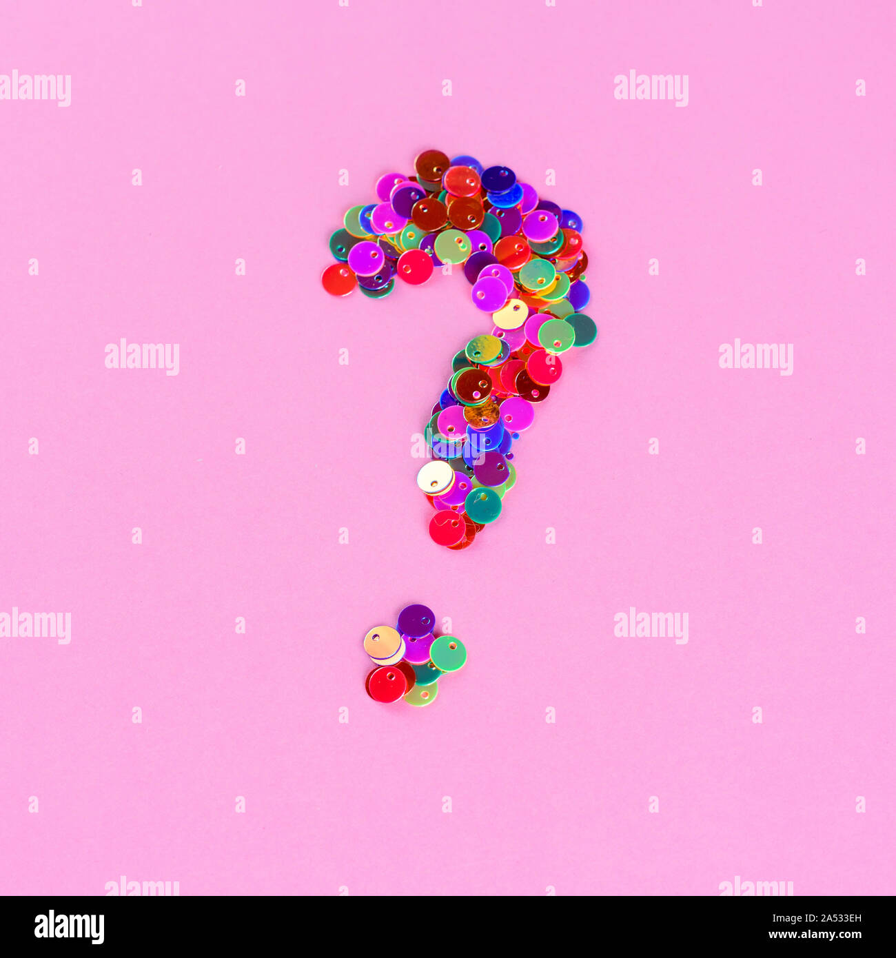 Holographic glitter question mark from sequins.Copy space. Stock Photo