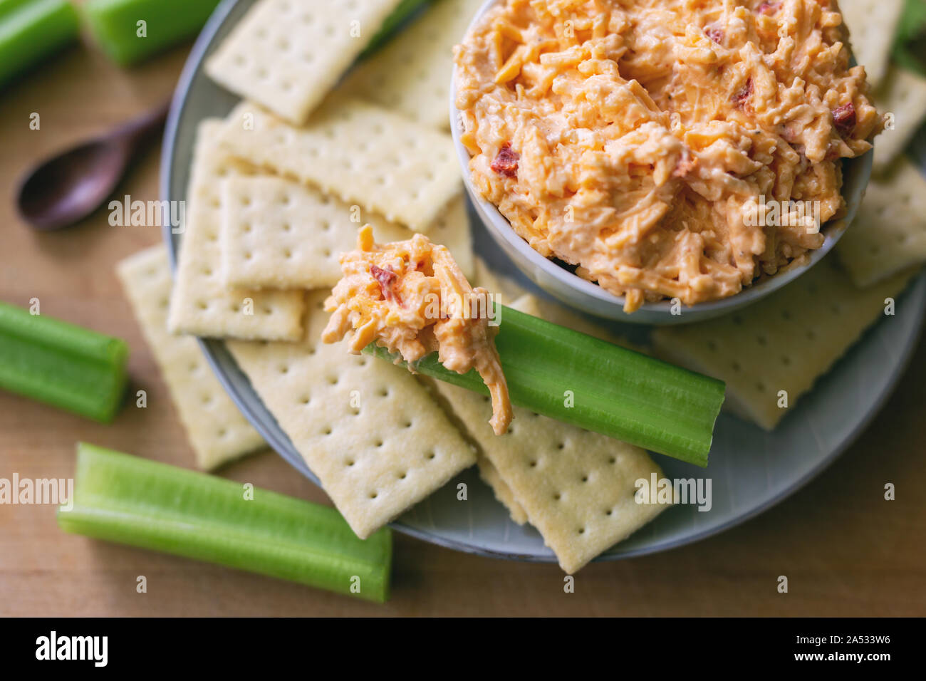 Pimento cheese spread with celery and club crackers Stock Photo Alamy