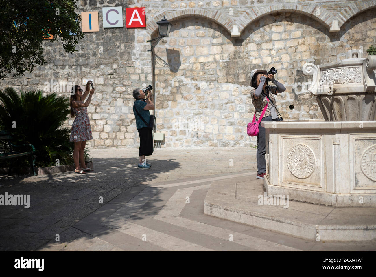 Montenegro, Sep 17, 2019: Tourists taking pictures of Kotor Old Town Stock Photo