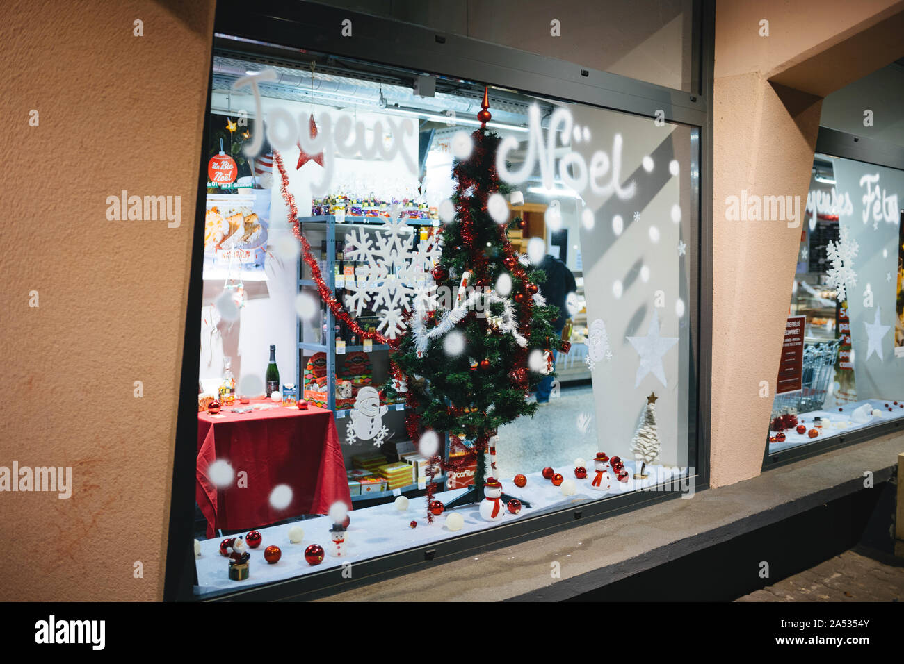Strasbourg, France - Dec 2, 2017: Happy New Year inscription on the Naturalia Bio store in French city Stock Photo